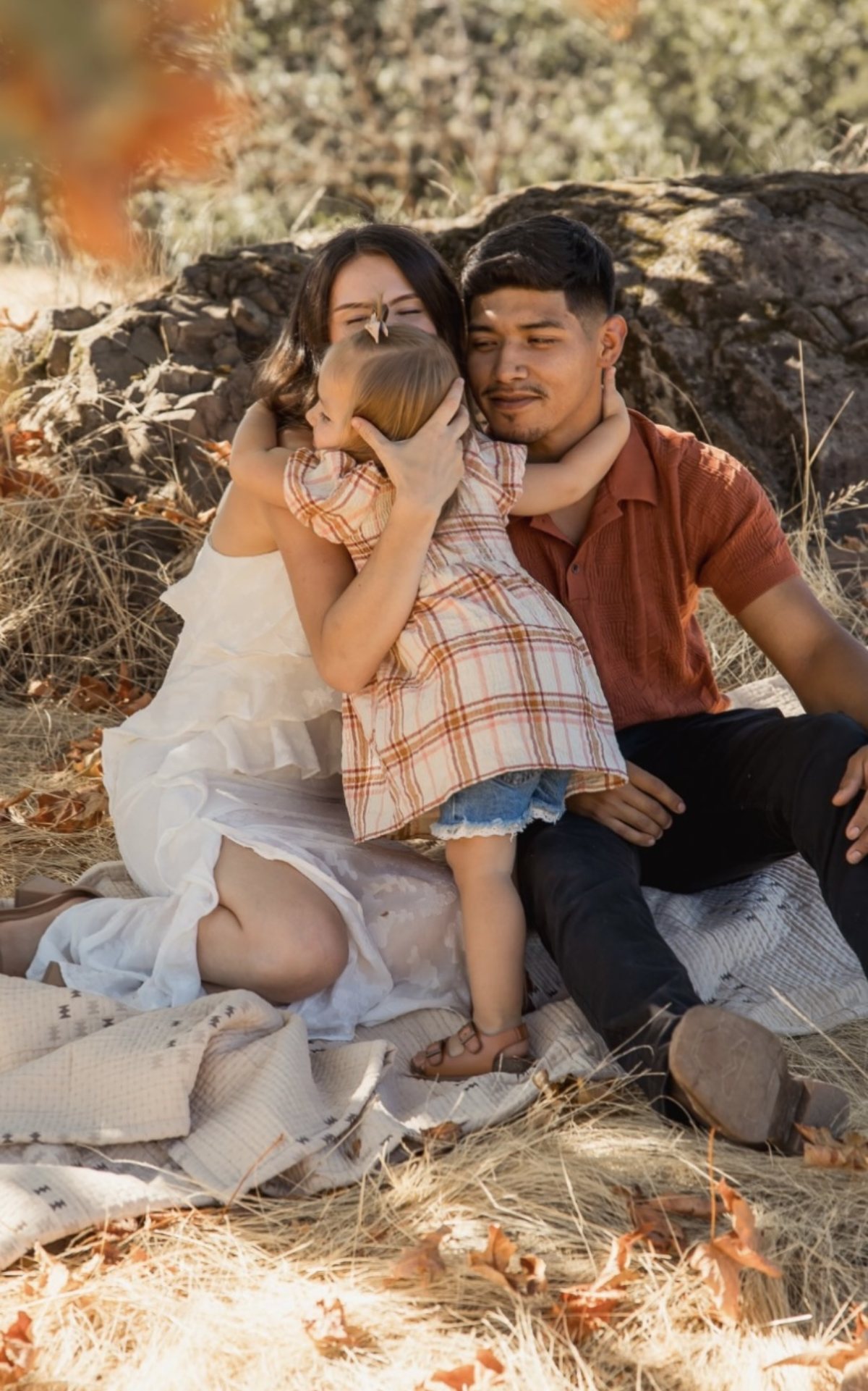 Hannah and Angel with their daughter